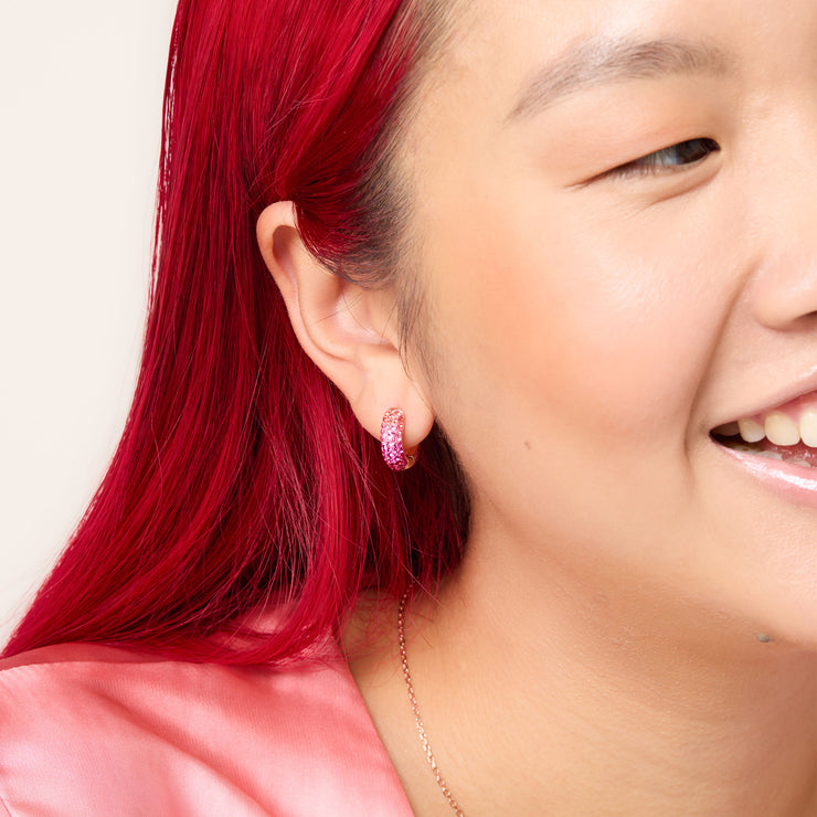 Prismatic Pink Sparkle Reversible Hoop Earrings — Small on model