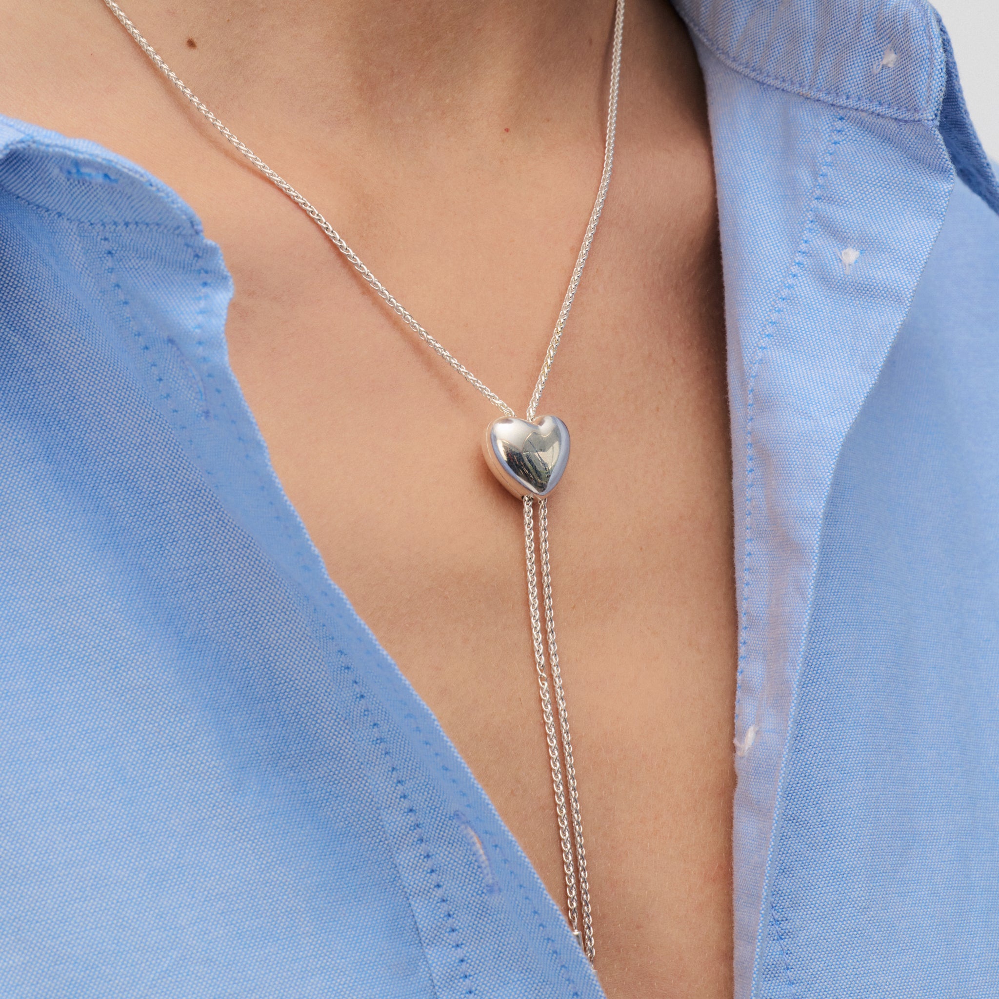 Puffy Heart Bolo Tie in silver on model