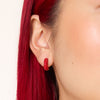 Red Sparkle Hoop Earrings — Small on model