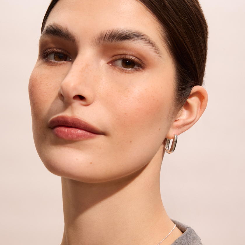Reversible Sparkle Link Hoop Earrings in White on model