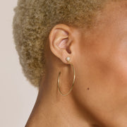 Revolve Pavé Hoop Earrings Gold on model