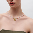Rose Quartz Charm Necklace on model