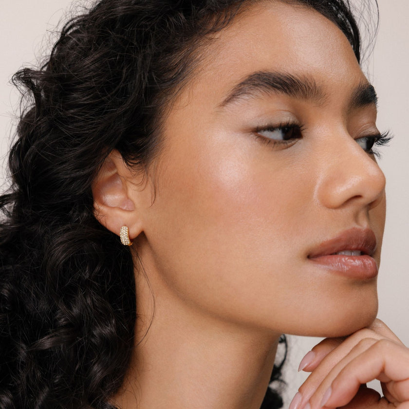 Soft Gold Sparkle Huggies on model