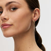 Leopard Small Sparkle Hoop Earrings on model