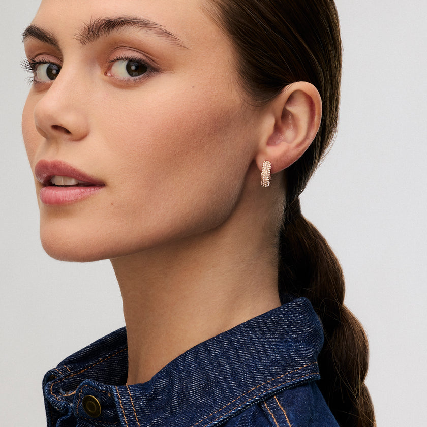 Rose Gold Small Sparkle Hoop Earrings on model