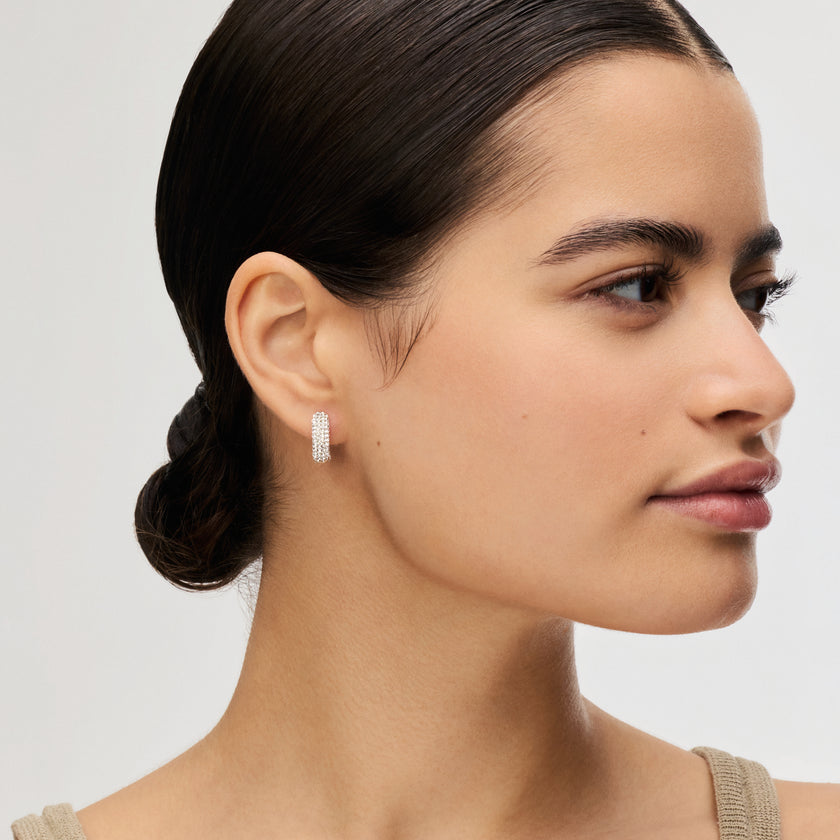 White Small Sparkle Hoop Earrings on model 
