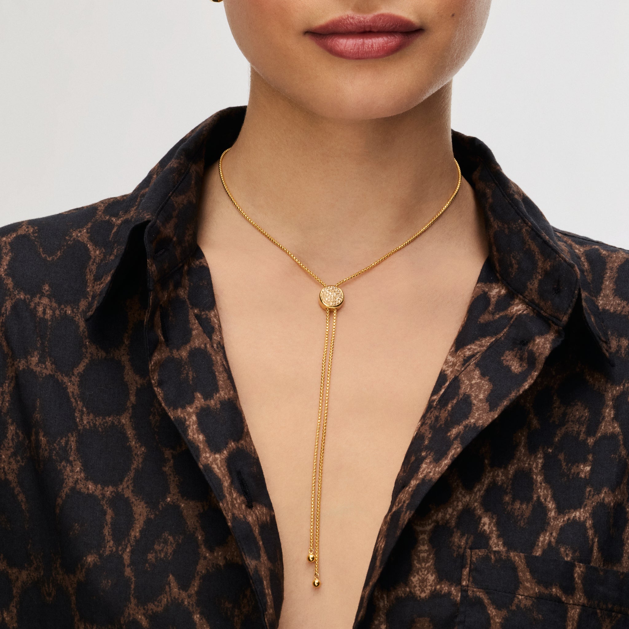 Soft Gold Sparkle Bezel Bolo Tie Necklace on model