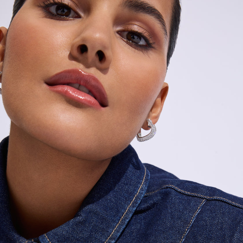 White Sparkle Heart Hoop Earrings on model