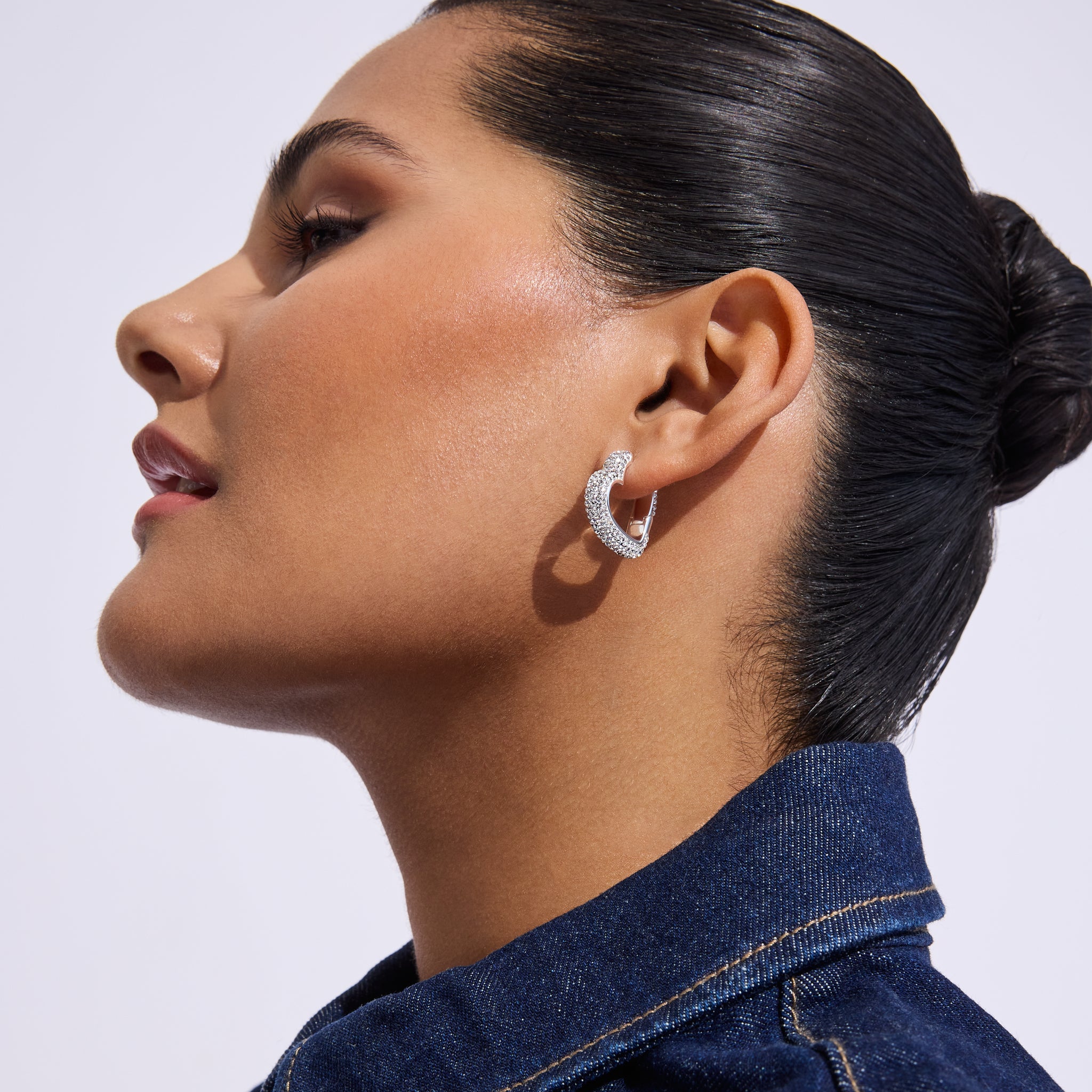 White Sparkle Heart Hoop Earrings on model