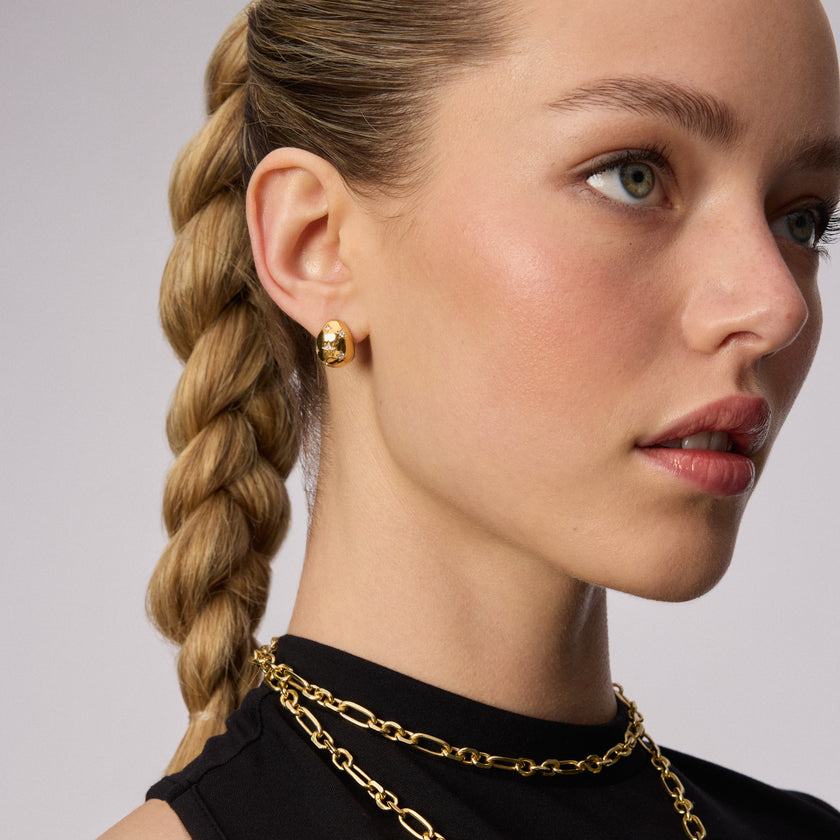 Starburst Stud Earrings on model