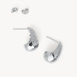 Silver Texture Puff Earrings laying flat