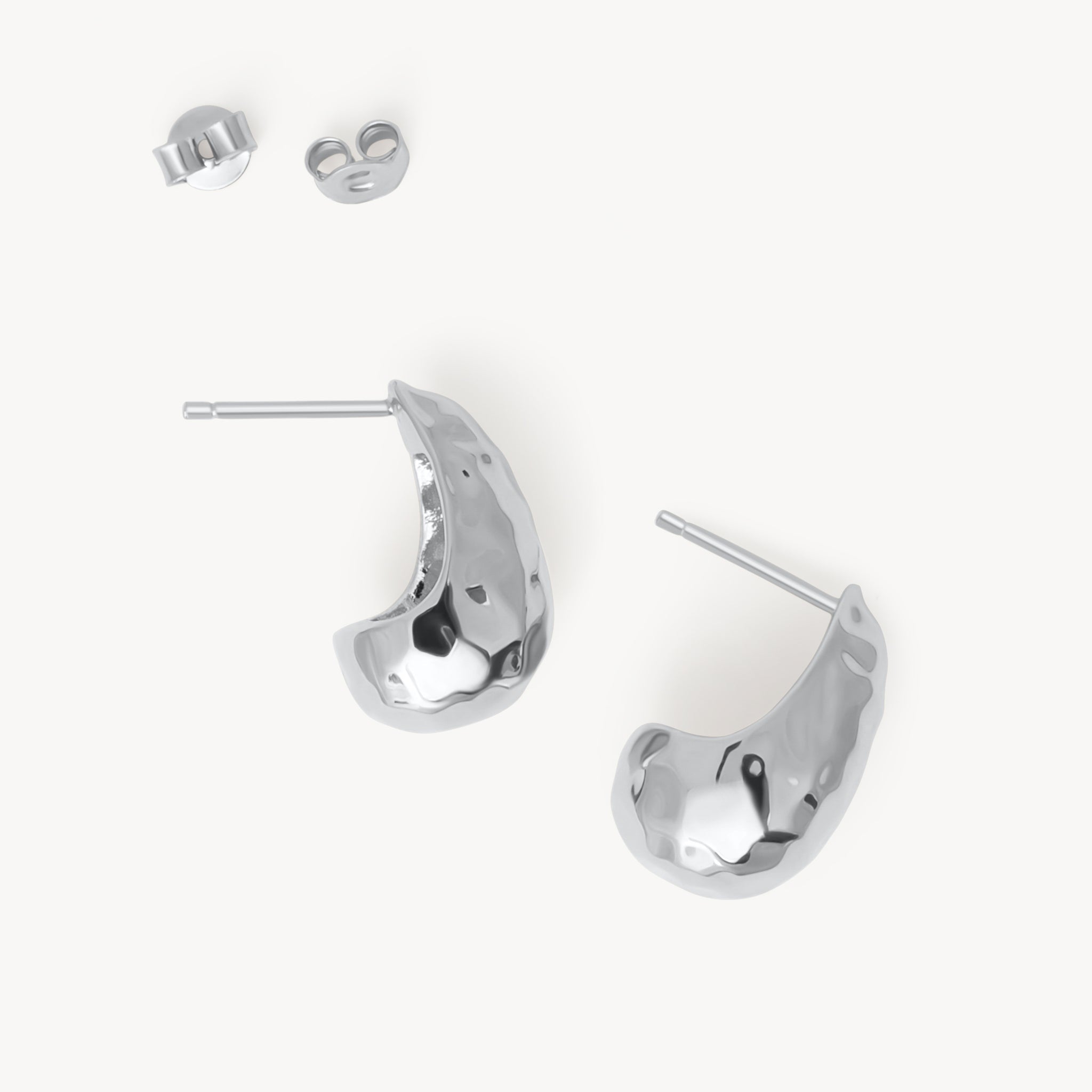 Silver Texture Puff Earrings laying flat