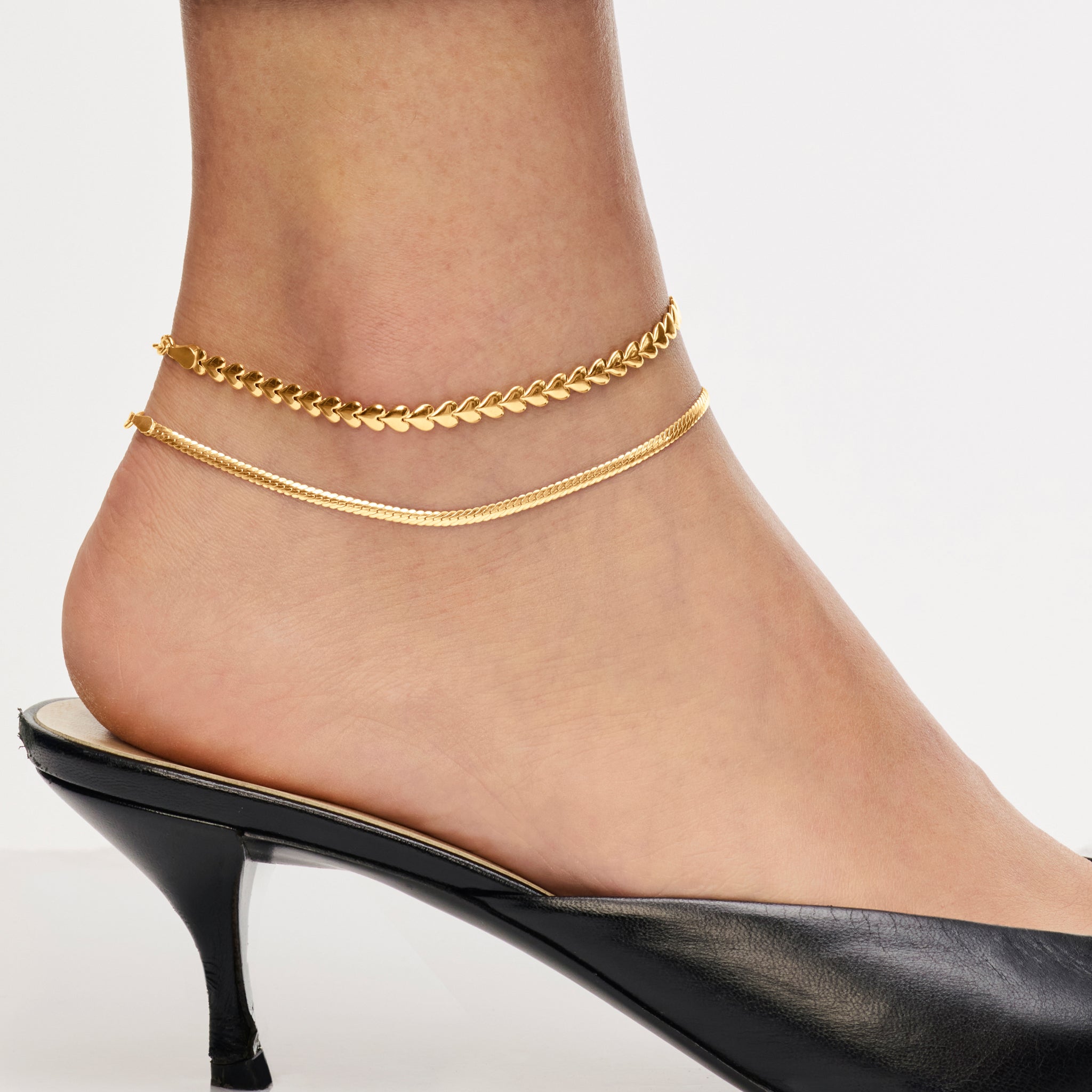 Gold Heart & Herringbone Anklet Set on model