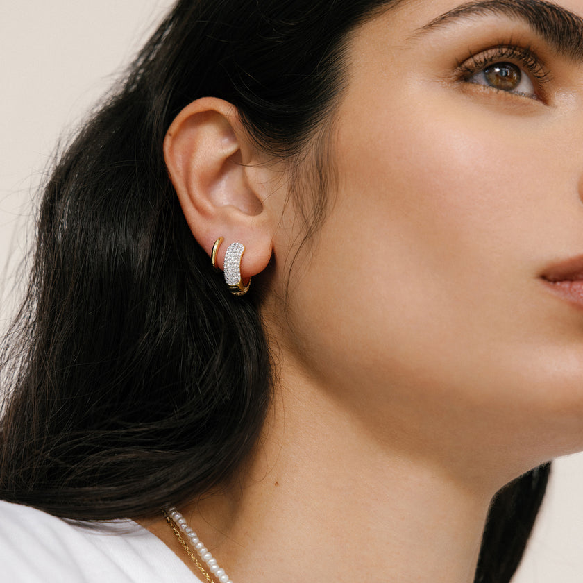 Soft Gold & White Small Sparkle Reversible Hoop Earrings on model
