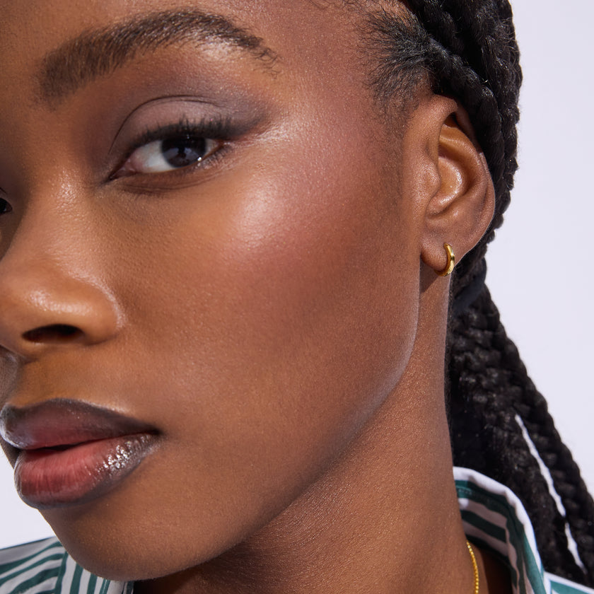 Extra Small Hoop Earrings on model