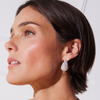 White Dream Puff™ Sparkle Stud Earrings on model