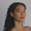 Small Dancing Queen Sparkle Ball™ Stud Earrings on model video