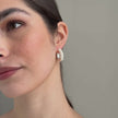 White Pearl Hoop Earrings on model video