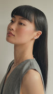 White Small Sparkle Ball™ Stud Earrings on model video
