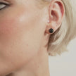 Small Sparkle Ball™ Stud Earrings on model