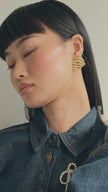 Drift Statement Earrings in Gold on model