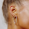 Hoop Earrings - Medium Gold on model