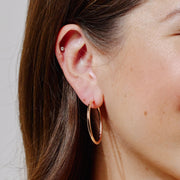 Hoop Earrings - Large Rose Gold on model