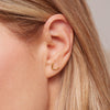 Boob Stud Earrings Gold on model